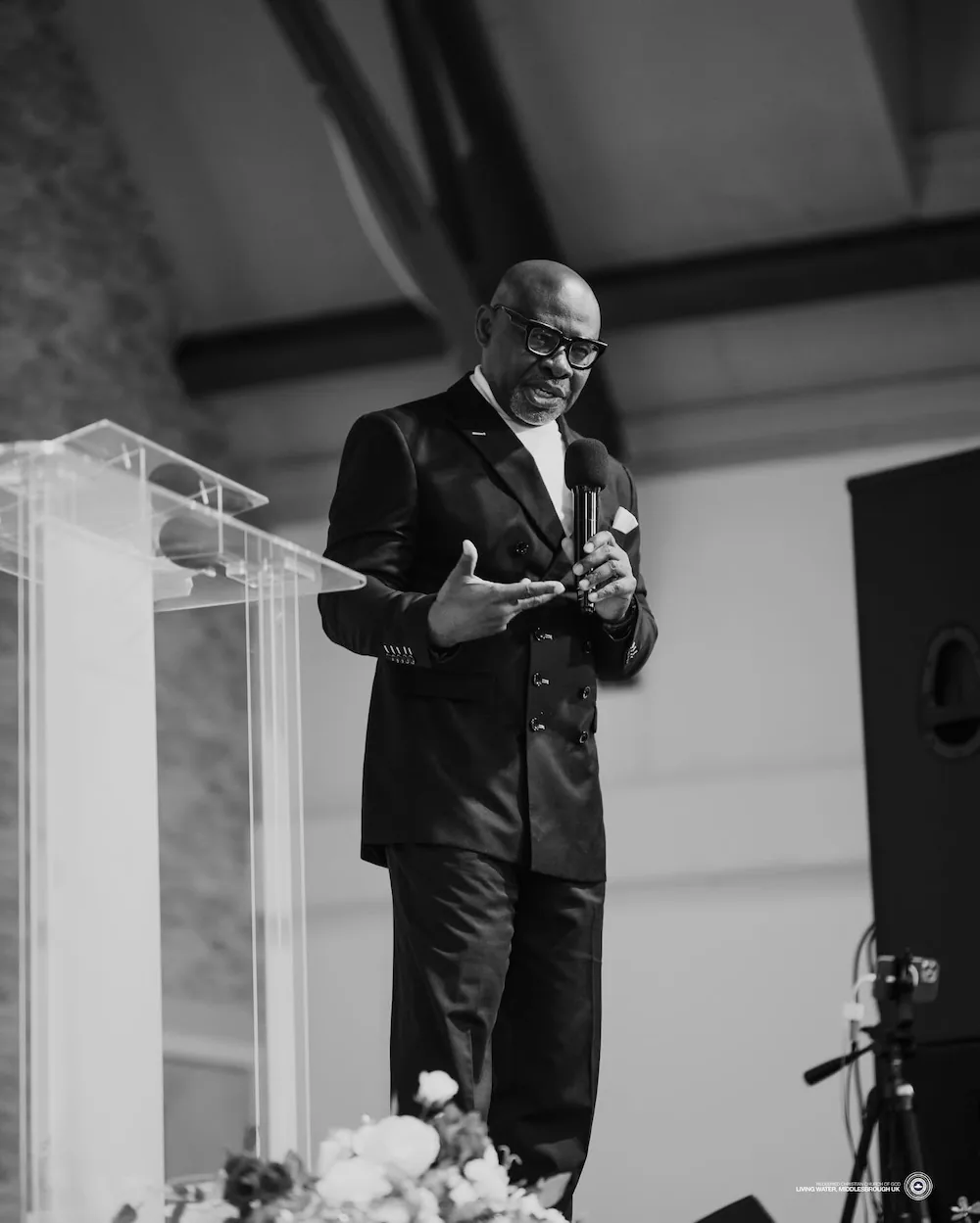 Resident pastor speaking from the church lectern